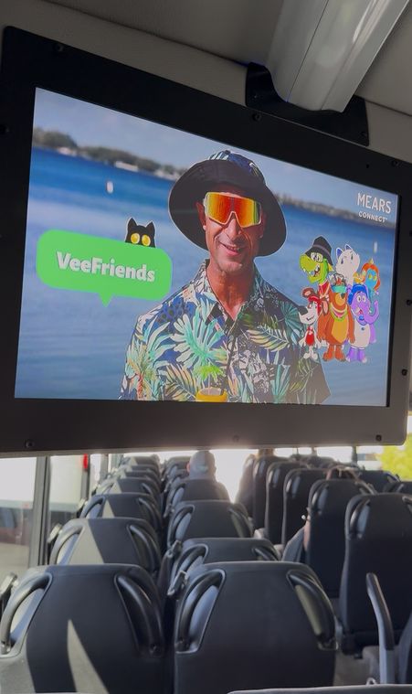 Mears Connect host, Sunny, introducing VeeFriends on your ride between Orlando Airport and Disney World, Disney Springs, and other Disney area resorts