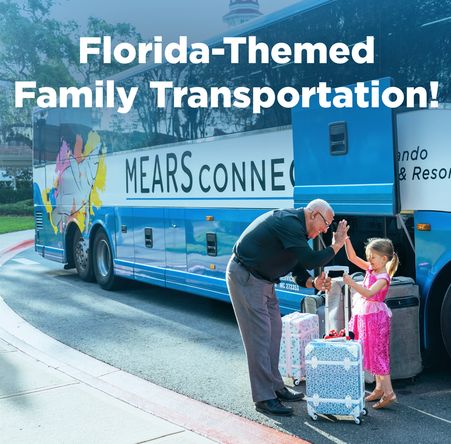 Mears coach bus driver high-fives a young girl as he takes her luggage beside a Mears Connect Orlando Airport shuttle bus with a manatee on it